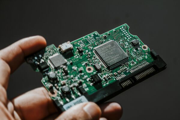 Close?up view of automotive PCB circuit board with integrated chips for vehicle electronics