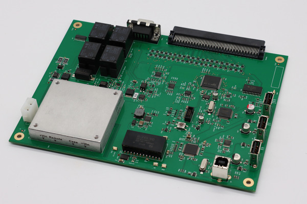Assembled PCBA circuit board with soldered IC chips, relays, connectors and heat sink showing finished PCB?assembly after bare?board fabrication