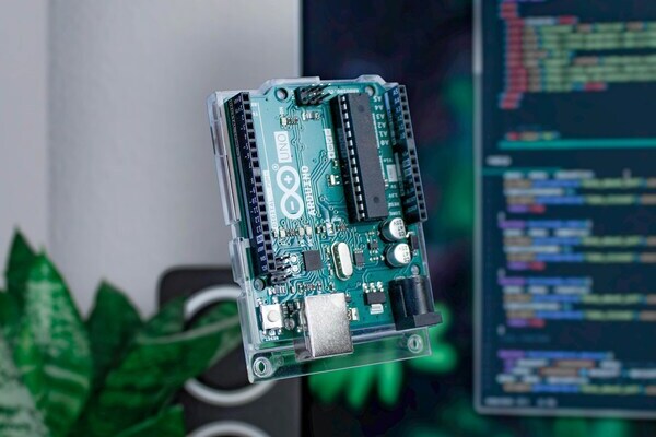 Arduino Uno microcontroller board with clear case