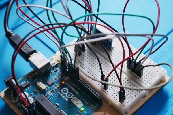 Arduino Uno circuit experiment on breadboard with jumper wires